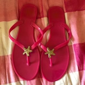 Pink starfish flip flops